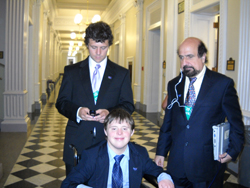 Micah Hetrick with his older brother and an AAPD staffer visit Capitol Hill to discuss how proposed cuts to Medicaid would negatively impact their family.